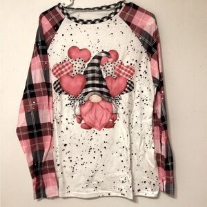 Unbranded NWT women’s long sleeve top with plaid sleeves. Size XL price is firm